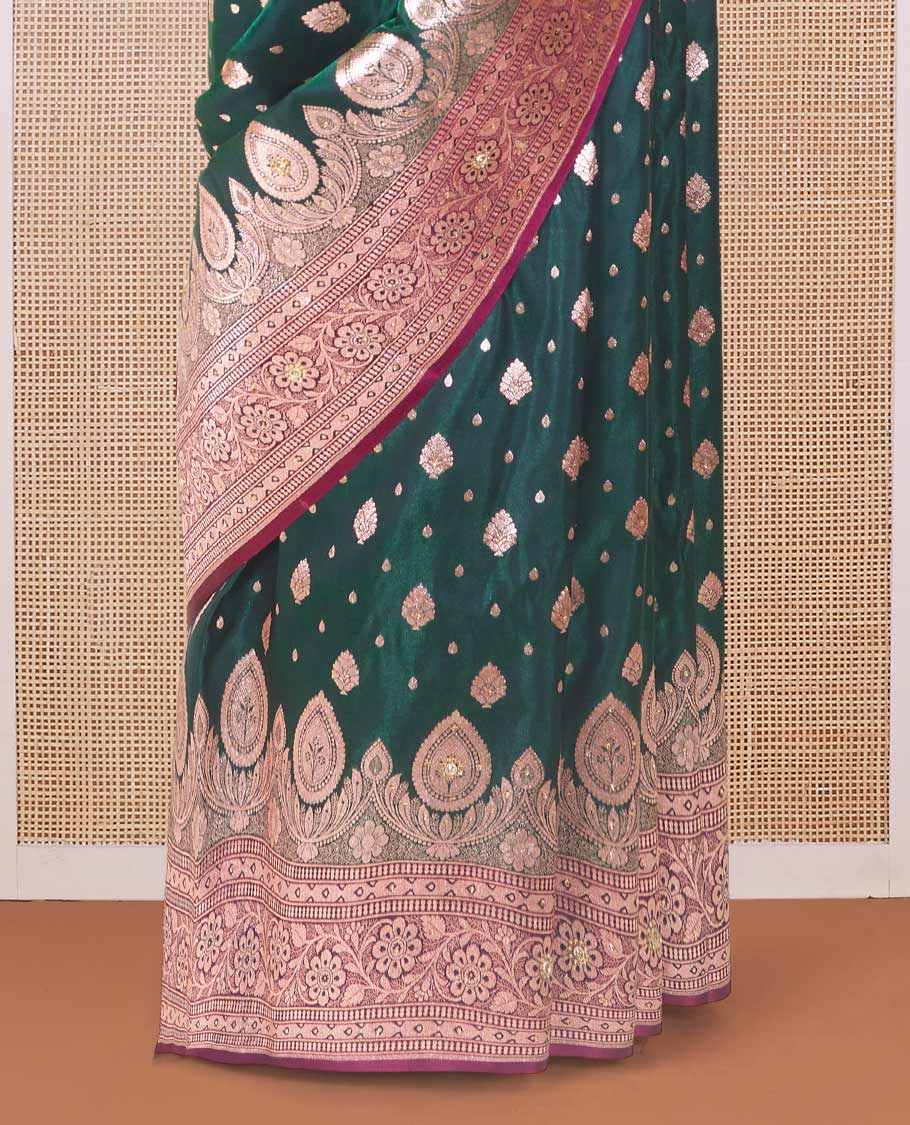 Dark green zari buttas with micro stonework banaras nylon silk saree, contrast floral creeper zari and stone work border, and zari woven jaal pallu