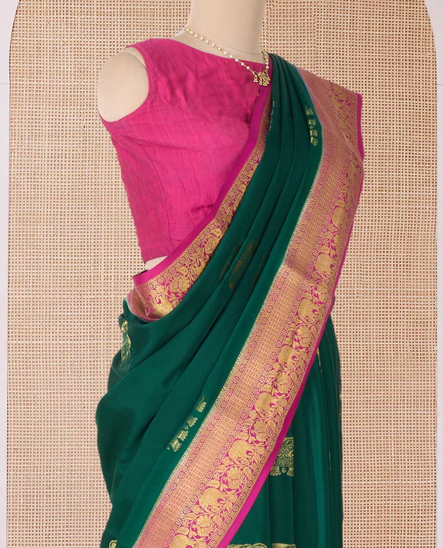 Green elephant motifs zari woven Mysore silk saree, contrast traditional zari border, and pallu of buttas and thick zari checks
