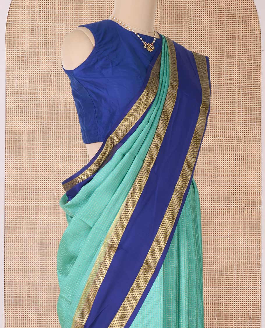 Green zari checked Mysore silk saree, contrast rettai pettu peacock eye zari border, and pallu of zari stripes
