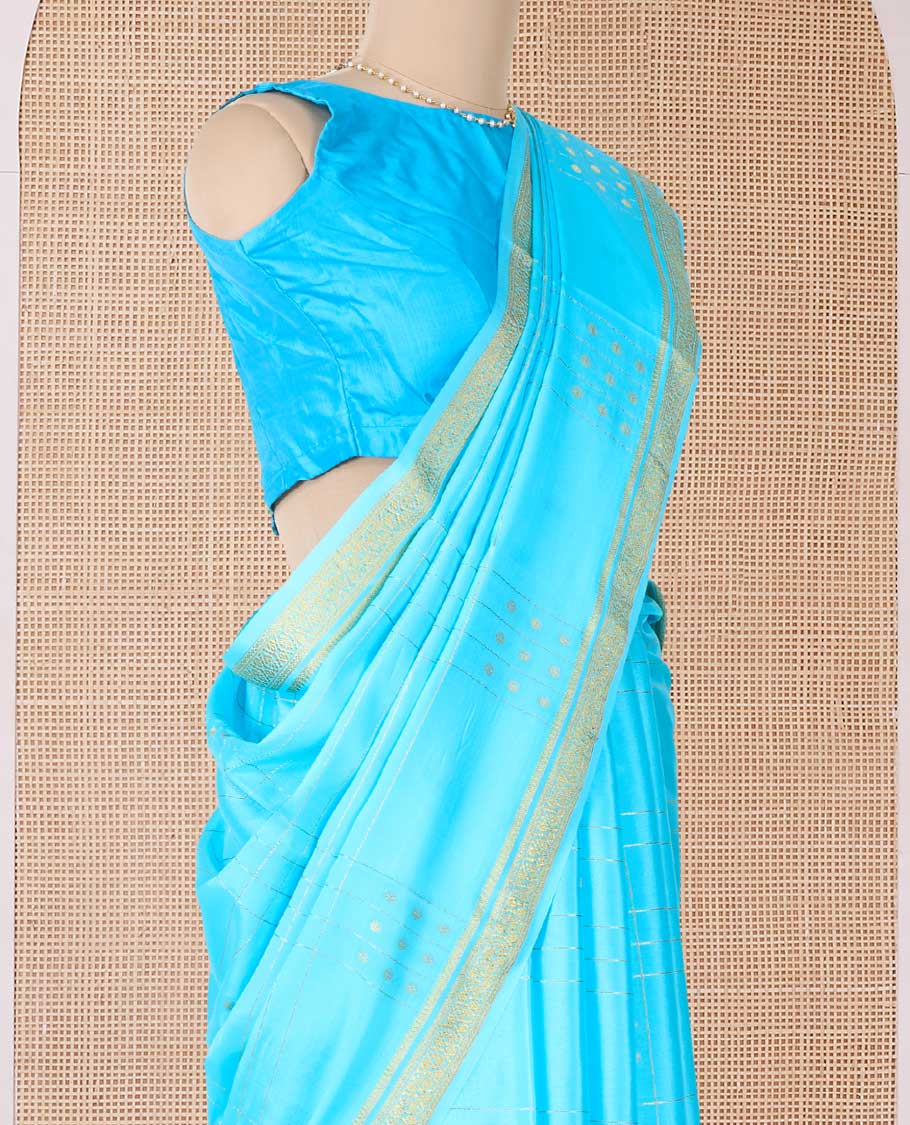 Blue buttas and checked Mysore silk saree, traditional zari border, and zari striped pallu