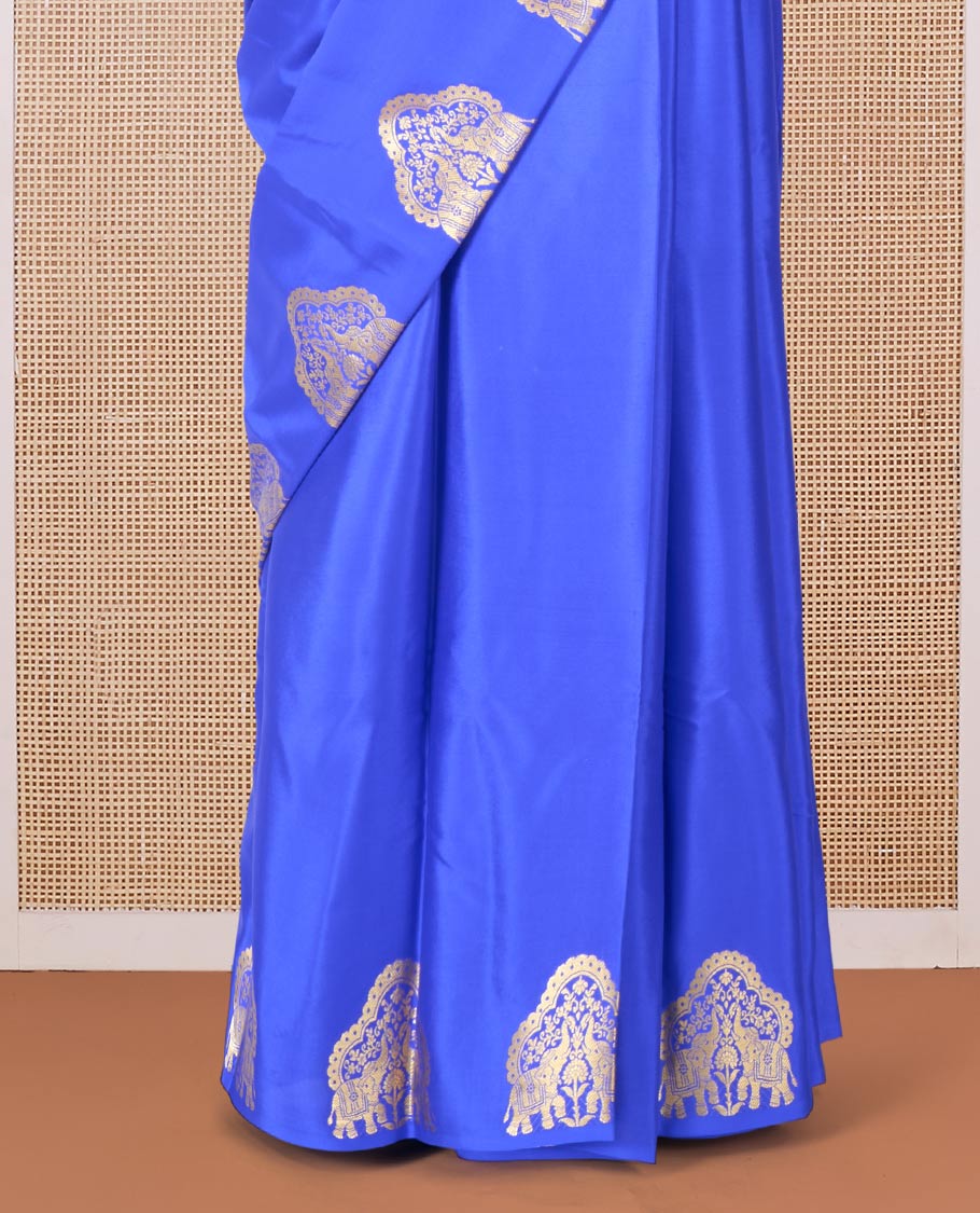 Blue plain Mysore silk saree, elephant motifs woven border, and pallu steeped with elephant motifs