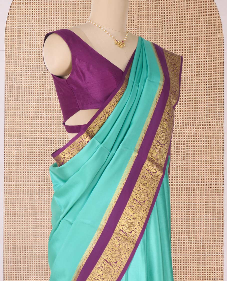 Green plain Mysore silk saree, contrast traditional zari rettai pettu border, and pallu of jaal design