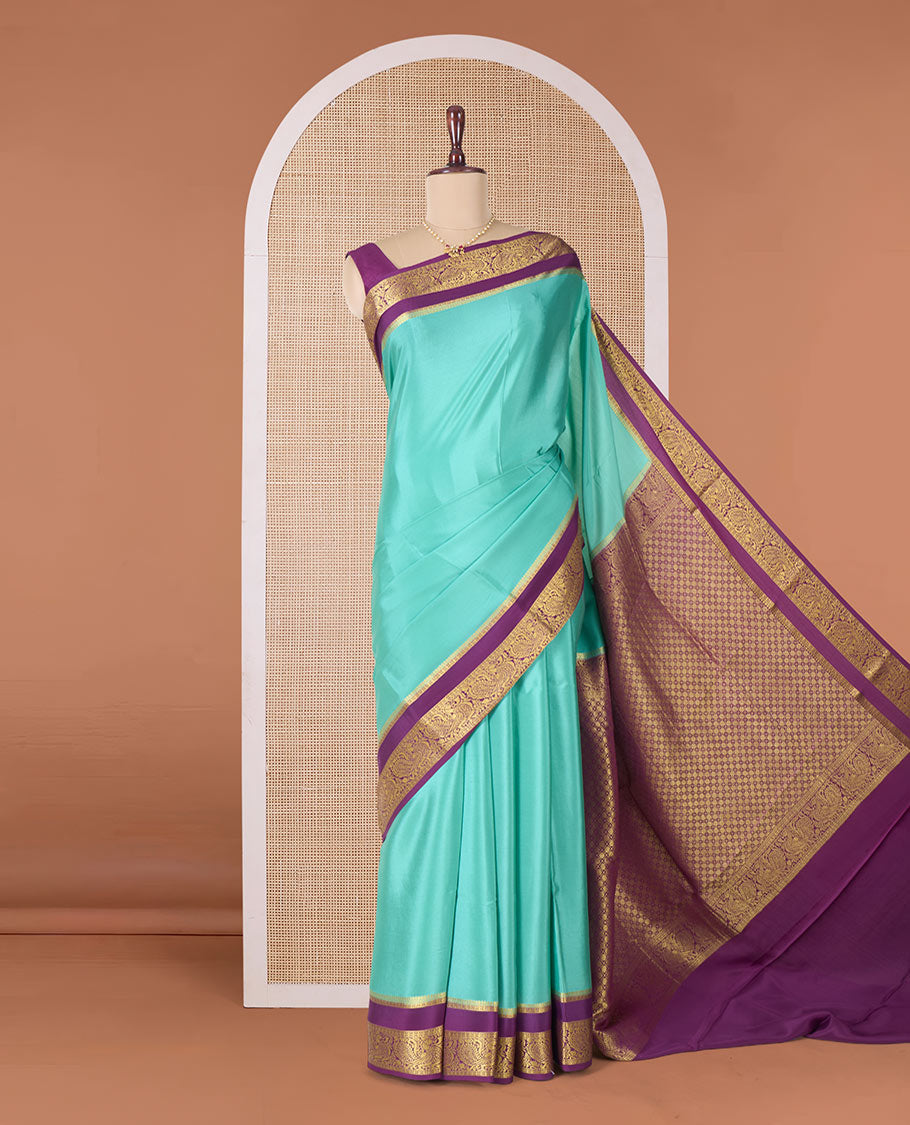 Green plain Mysore silk saree, contrast traditional zari rettai pettu border, and pallu of jaal design