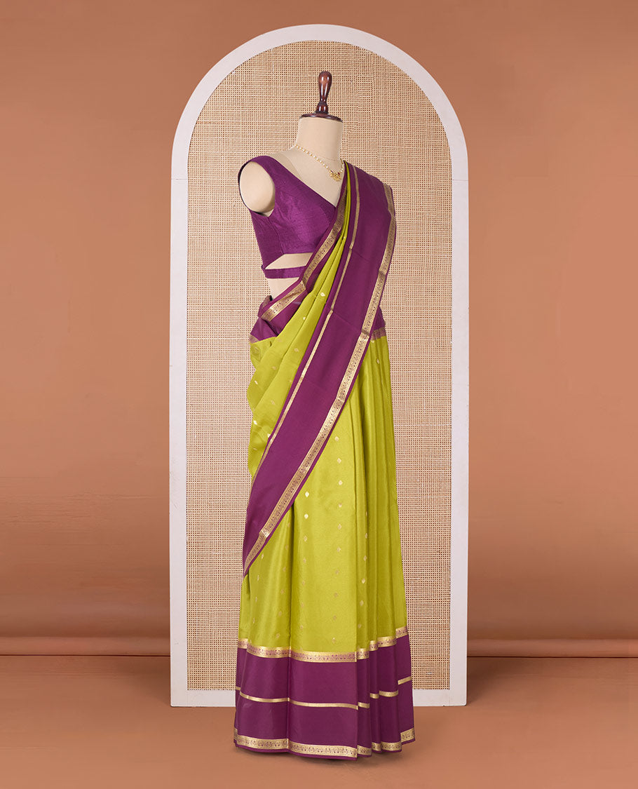 Green zari buttas Mysore silk saree, contrast traditional zari border, and pallu of Temple design in thick zari