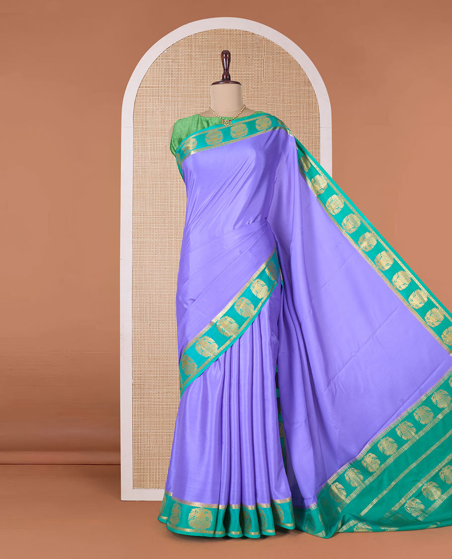 Lavender plain Mysore silk saree, contrast two-headed eagle border, and pallu of traditional designs