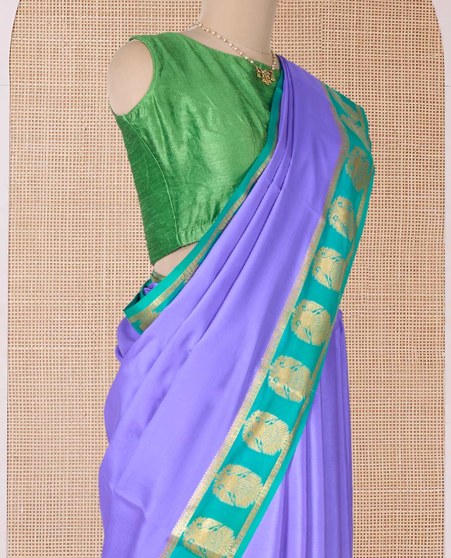 Lavender plain Mysore silk saree, contrast two-headed eagle border, and pallu of traditional designs