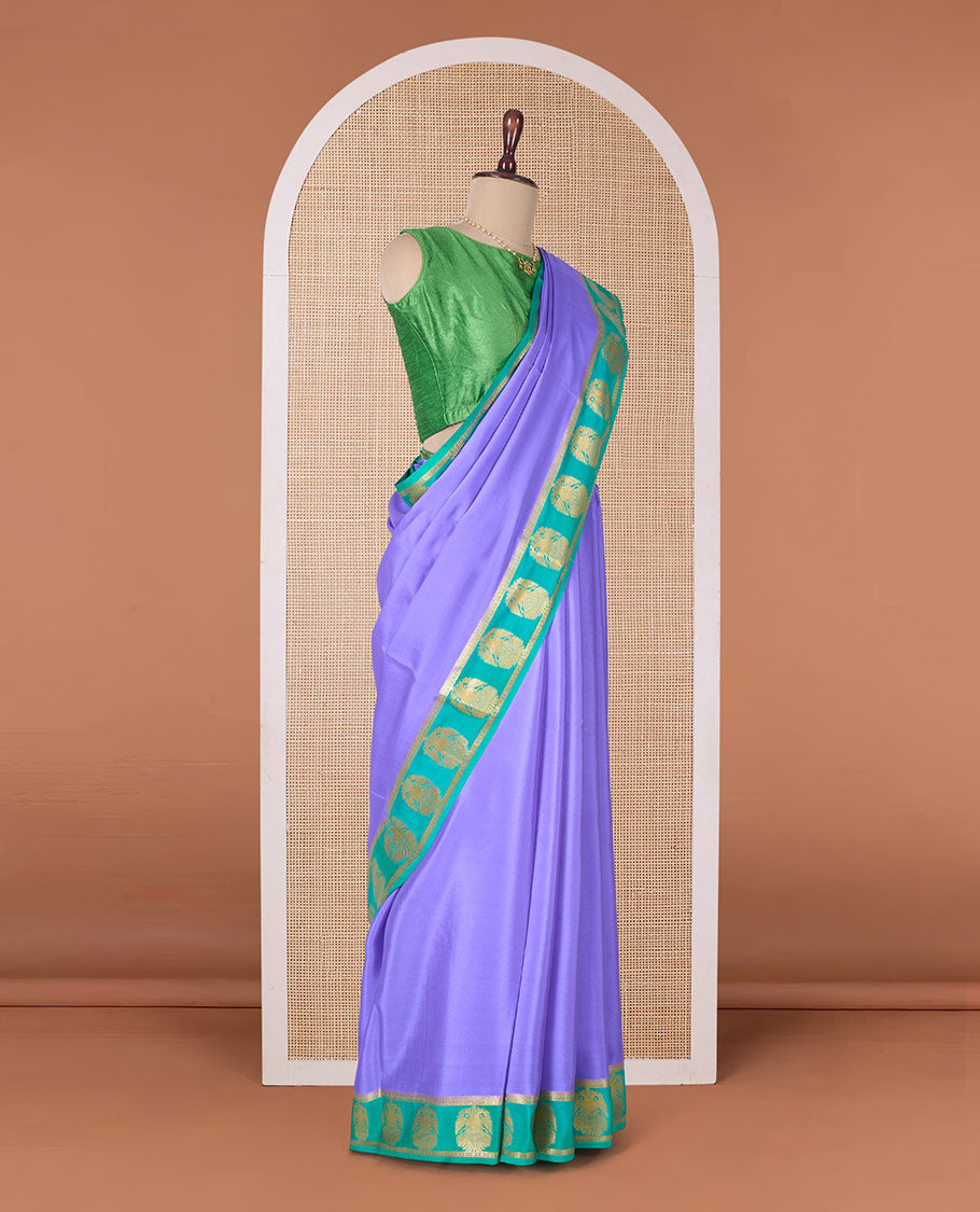 Lavender plain Mysore silk saree, contrast two-headed eagle border, and pallu of traditional designs