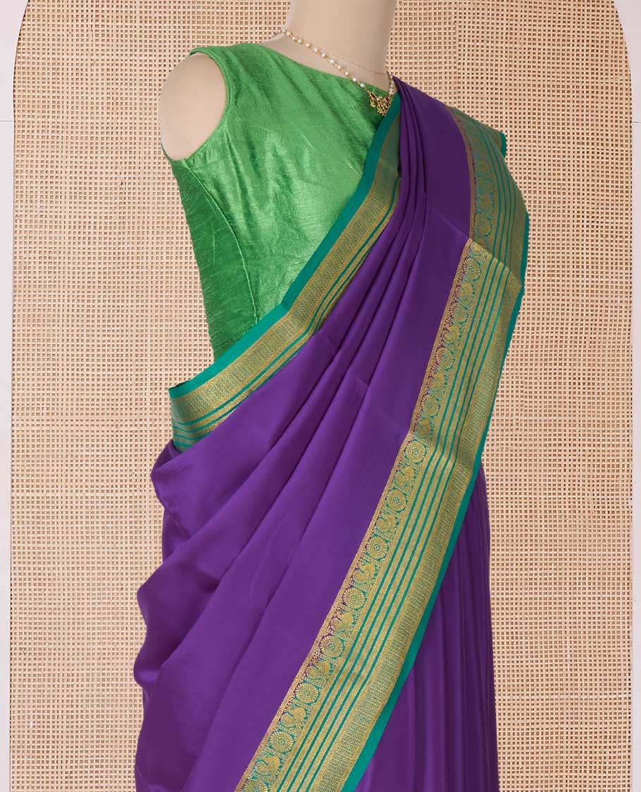 Violet plain Mysore silk saree, contrast traditional zari border of Peacock chakram, and pallu steeped with traditional zari designs
