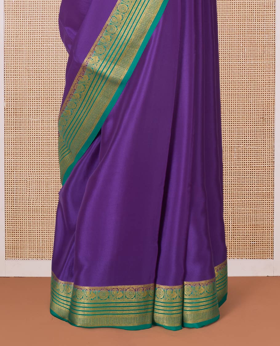 Violet plain Mysore silk saree, contrast traditional zari border of Peacock chakram, and pallu steeped with traditional zari designs