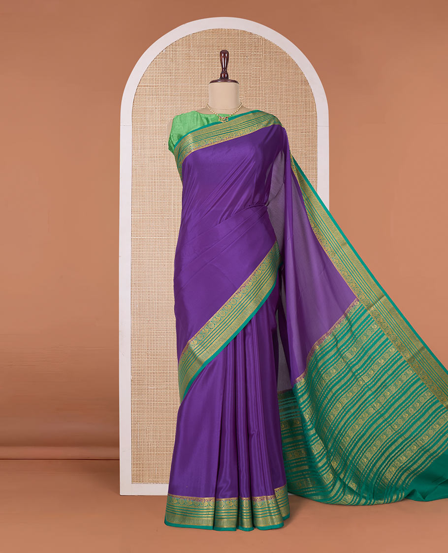Violet plain Mysore silk saree, contrast traditional zari border of Peacock chakram, and pallu steeped with traditional zari designs