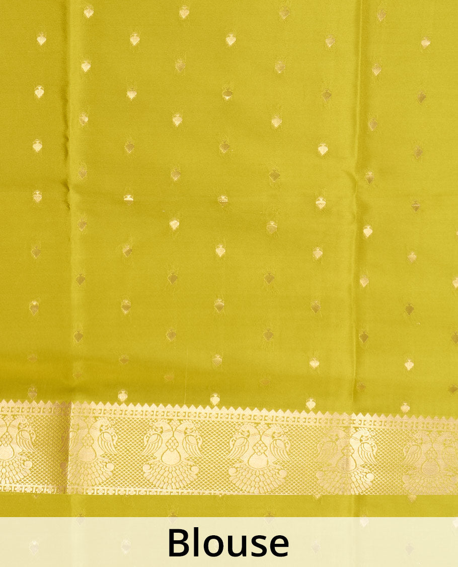 Green plain Mysore silk saree, zari border of two-headed eagle motifs, and pallu of zari designs