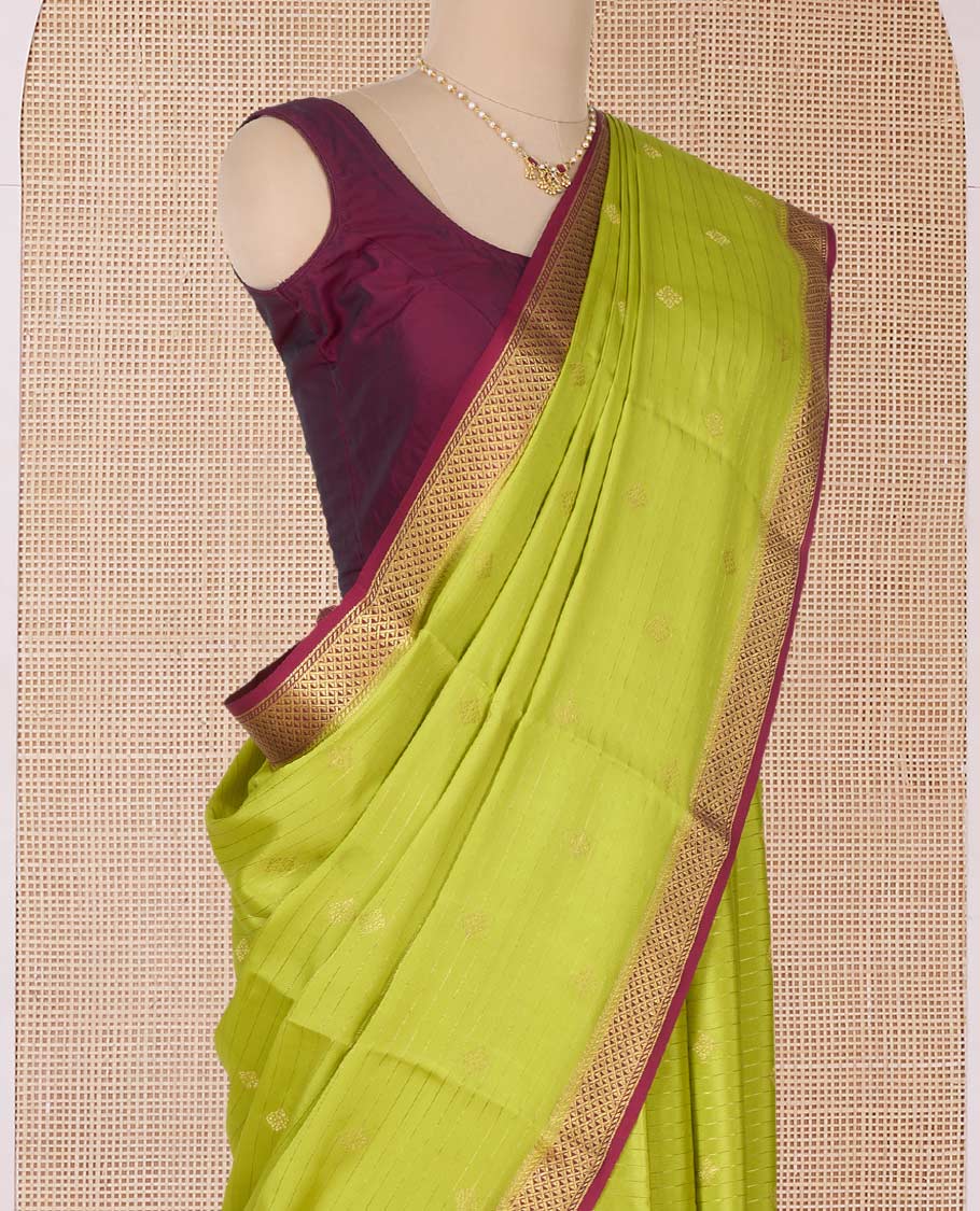 Lemon yellow zari striped and zari buttas Mysore silk saree, contrast jaal zari border, pallu of jaal design