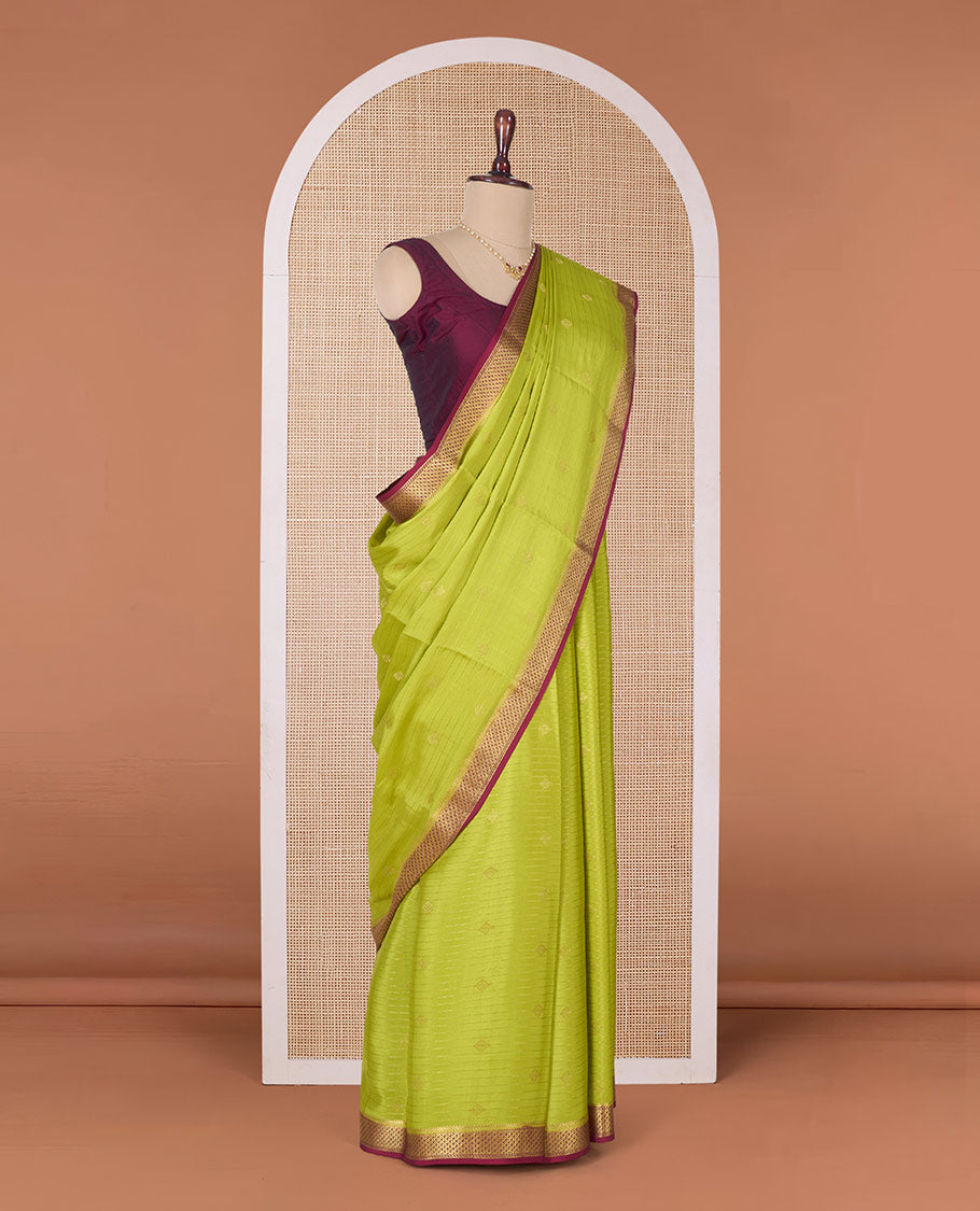 Lemon yellow zari striped and zari buttas Mysore silk saree, contrast jaal zari border, pallu of jaal design