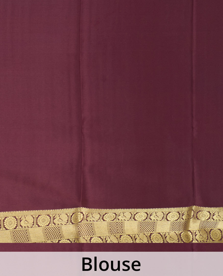 Orange zari buttas Mysore silk saree, contrast peacock chakram zari buttas border, and pallu steeped with traditional designs