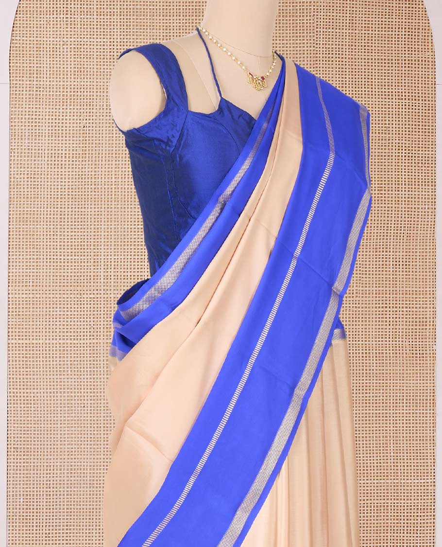 Sandal plain Mysore silk saree, contrast rettai pettu traditional zari border, and pallu of zari sparsely woven stripes