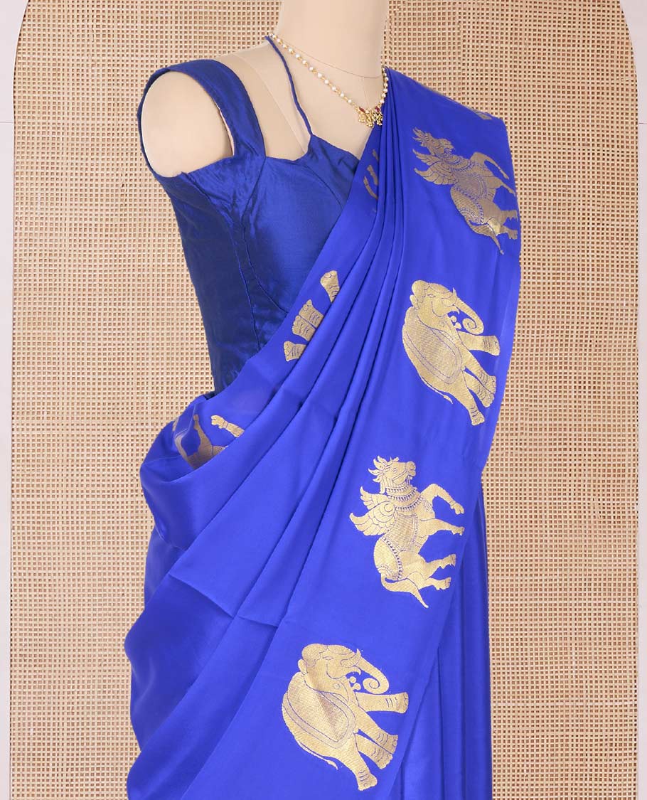 Blue plain Mysore silk saree with self-border of big elephant and horse motifs in zari, and pallu of miniatures of elephant and horse motifs