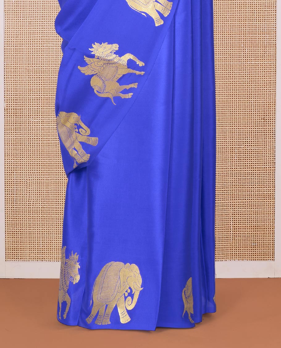 Blue plain Mysore silk saree with self-border of big elephant and horse motifs in zari, and pallu of miniatures of elephant and horse motifs