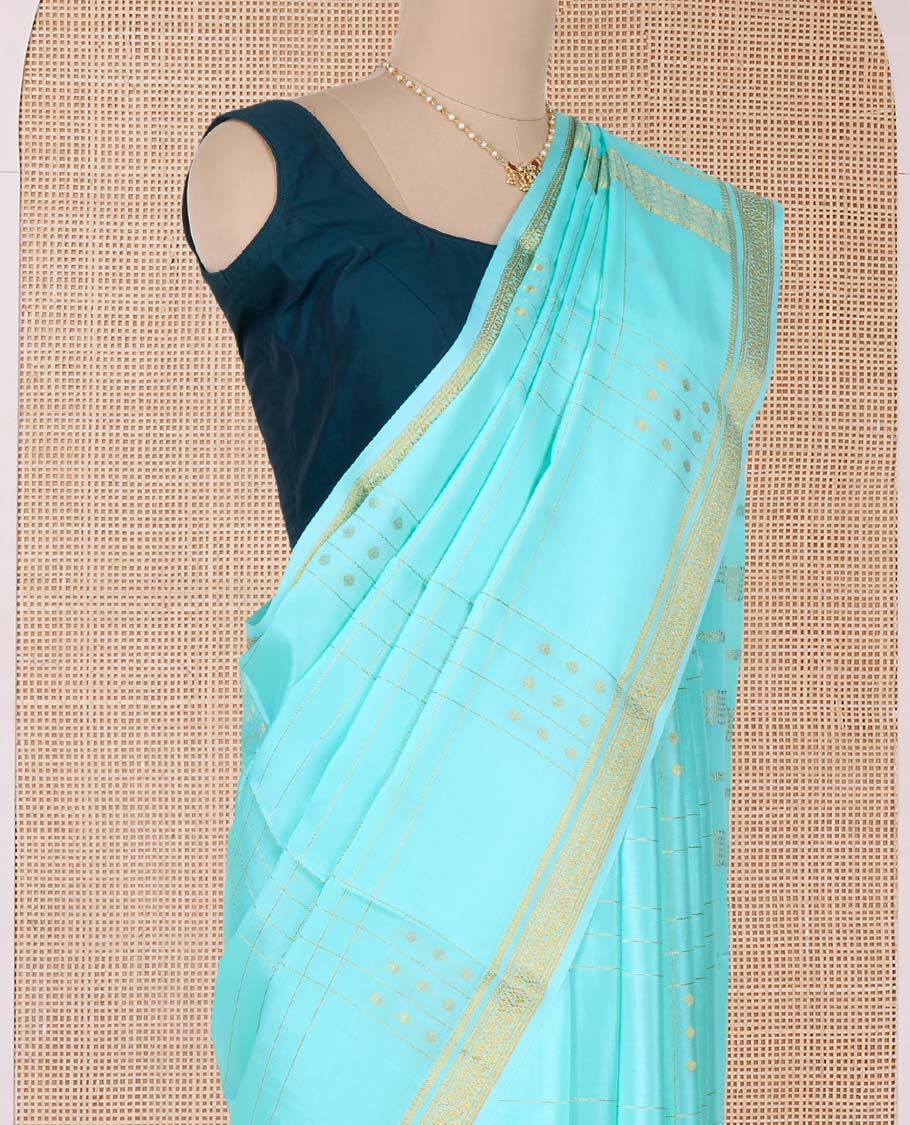 Green zari buttas, and checked Mysore silk saree, zari border, and pallu of zari stripes