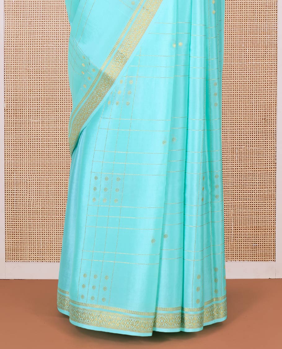 Green zari buttas, and checked Mysore silk saree, zari border, and pallu of zari stripes
