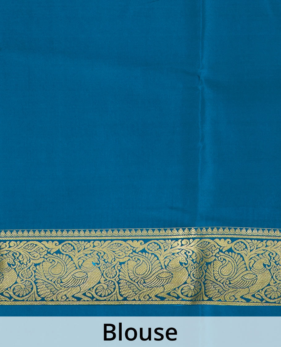 Peacock color embossed Mysore silk saree, traditional peacock motifs zari woven border, and pallu of traditional designs