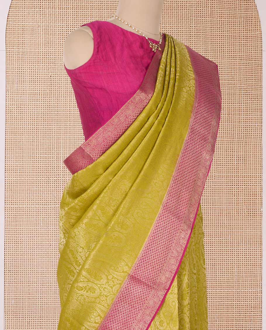 Yellow paisley jacquard Mysore silk saree, contrast traditional zari border, and pallu of floral jaal design