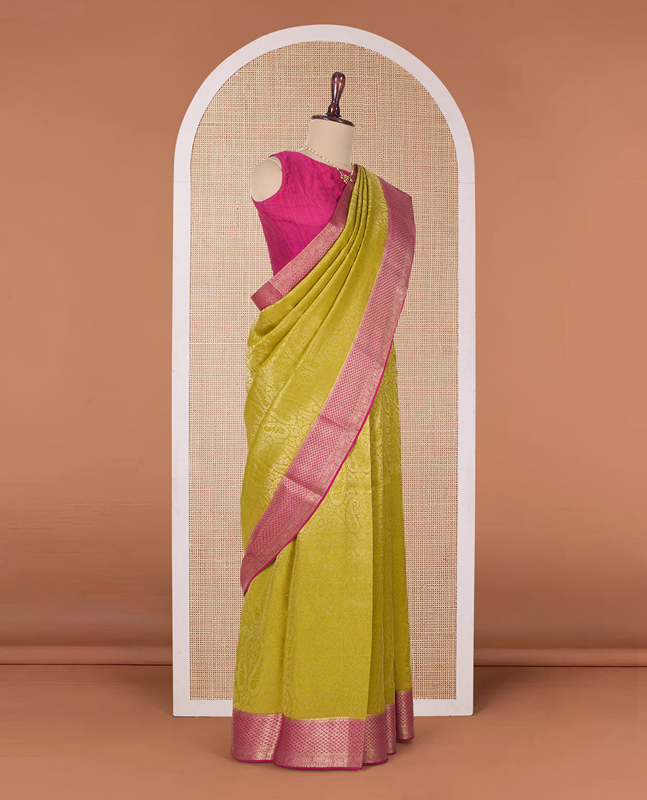 Yellow paisley jacquard Mysore silk saree, contrast traditional zari border, and pallu of floral jaal design