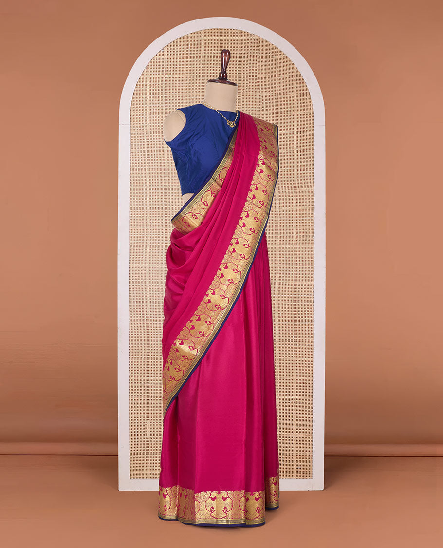 Pink plain Mysore silk saree, two-headed eagle zari border, and pallu steeped with two-headed eagle motifs