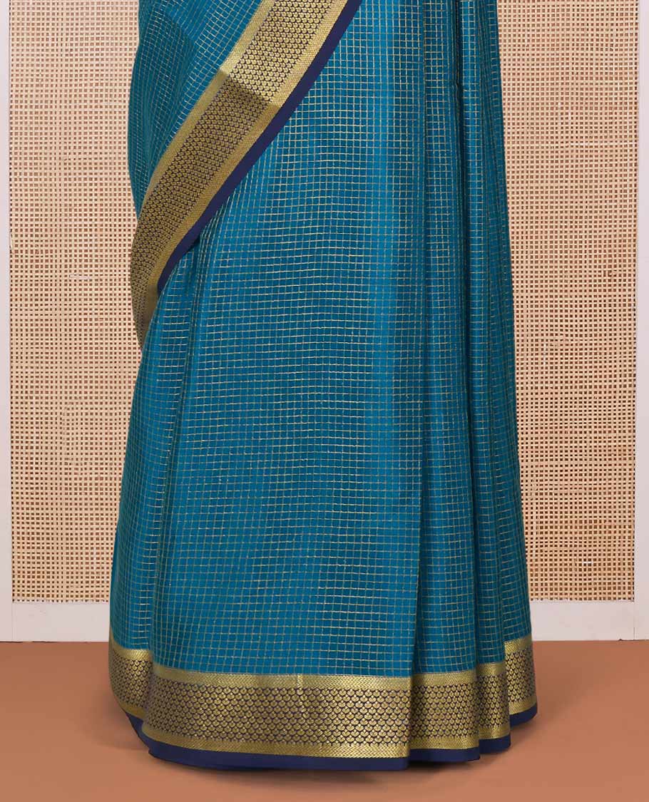 Green micro zari checked Mysore silk saree, contrast zari border, and pallu features traditional zari designs