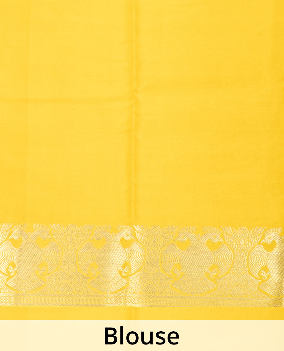 Yellow plain Mysore silk saree, two-headed eagle zari border, and pallu steeped with two-headed eagle motifs
