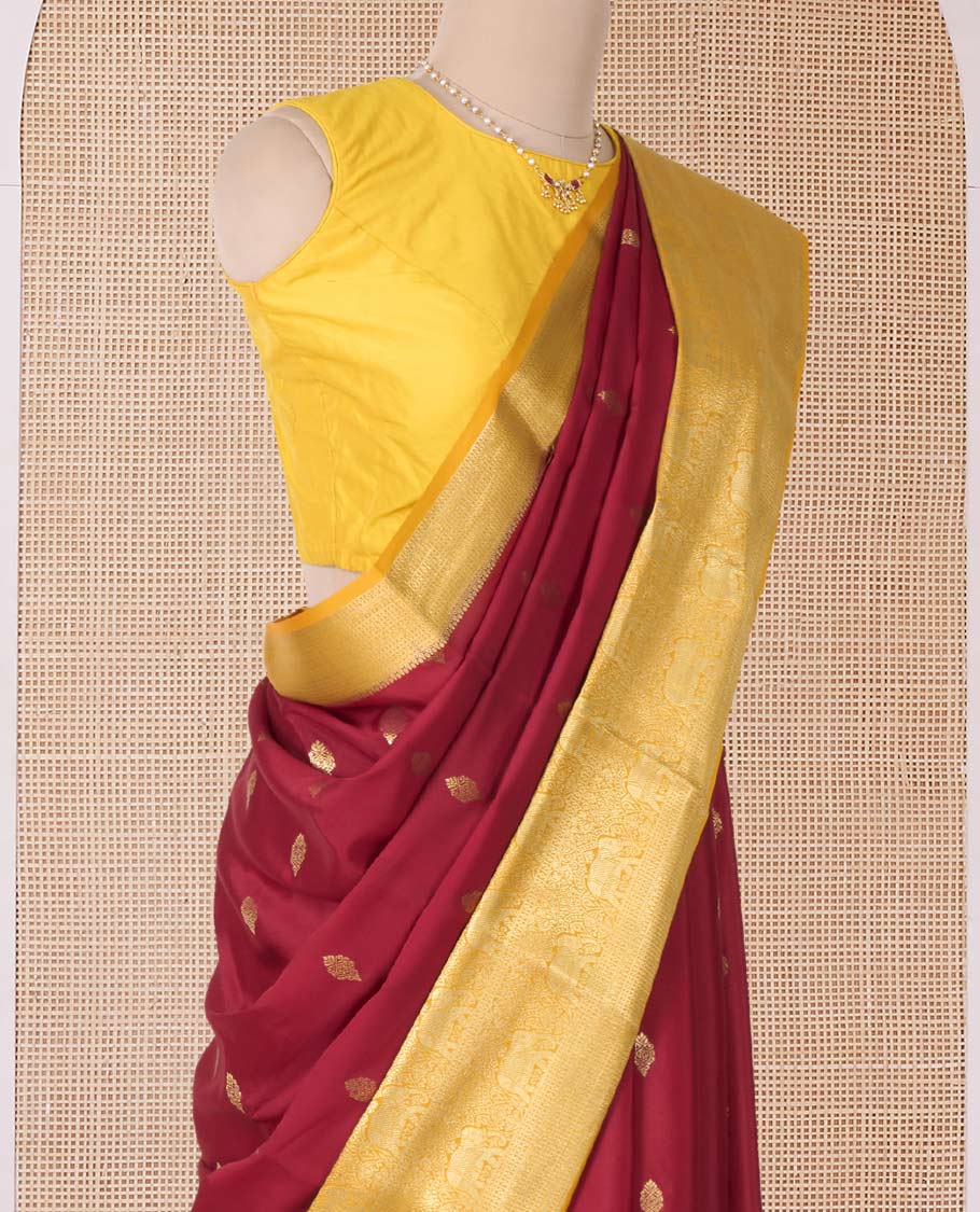 Maroon zari buttas Mysore silk saree with contrast traditional zari border, and a pallu of paisleys