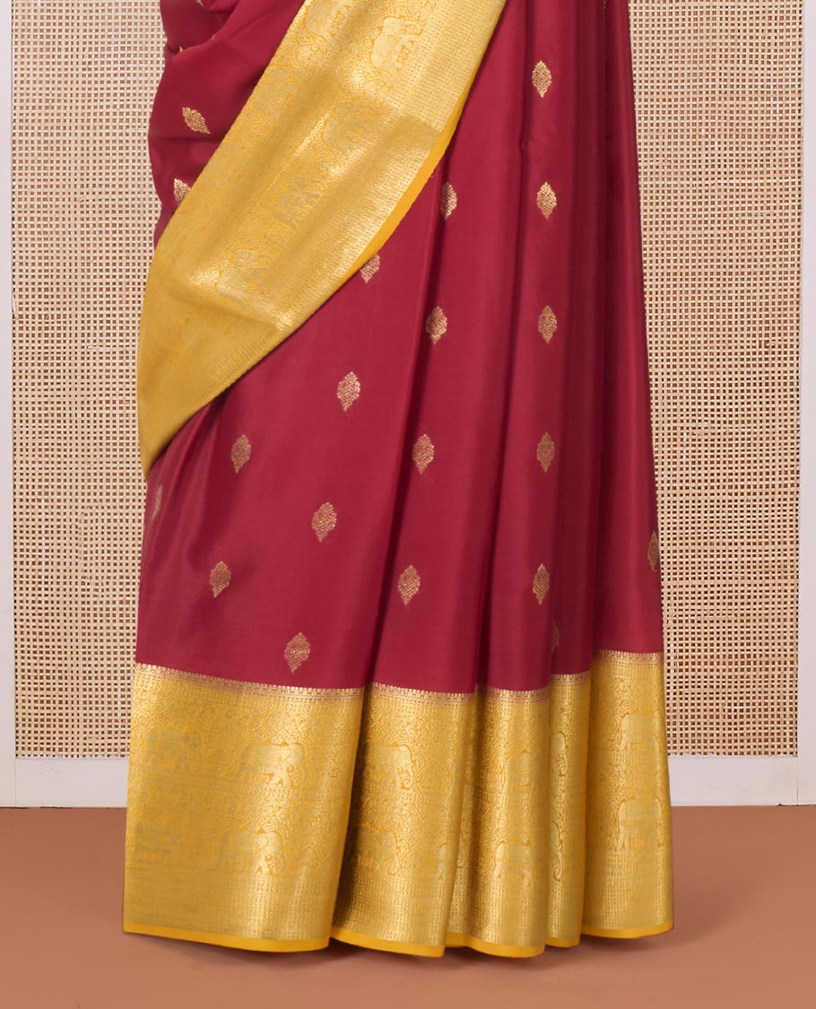 Maroon zari buttas Mysore silk saree with contrast traditional zari border, and a pallu of paisleys