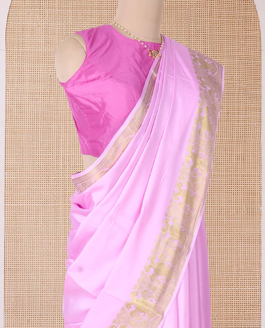 Pink plain Mysore silk saree, two-headed eagle zari border, and pallu steeped with two-headed eagle motifs