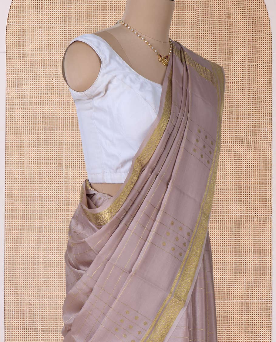 Beige zari buttas and checked Mysore silk saree, traditional zari border, and zari striped pallu