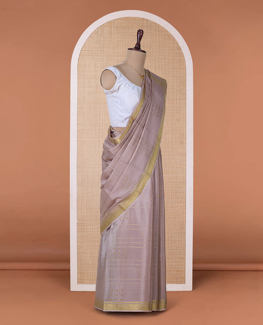 Beige zari buttas and checked Mysore silk saree, traditional zari border, and zari striped pallu