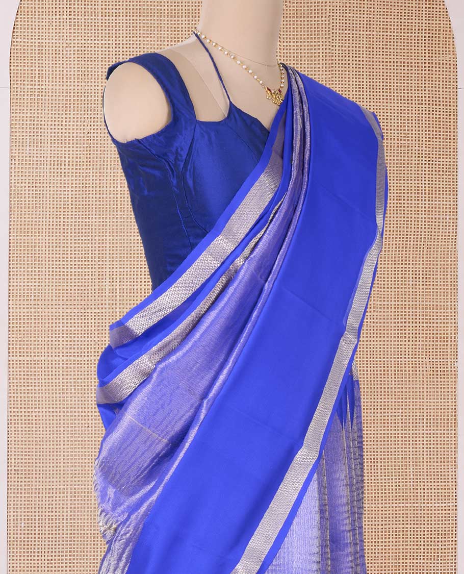 Blue shimmer Mysore silk saree, contrast rettai pettu traditional designs, and pallu of Pichwai cow motifs