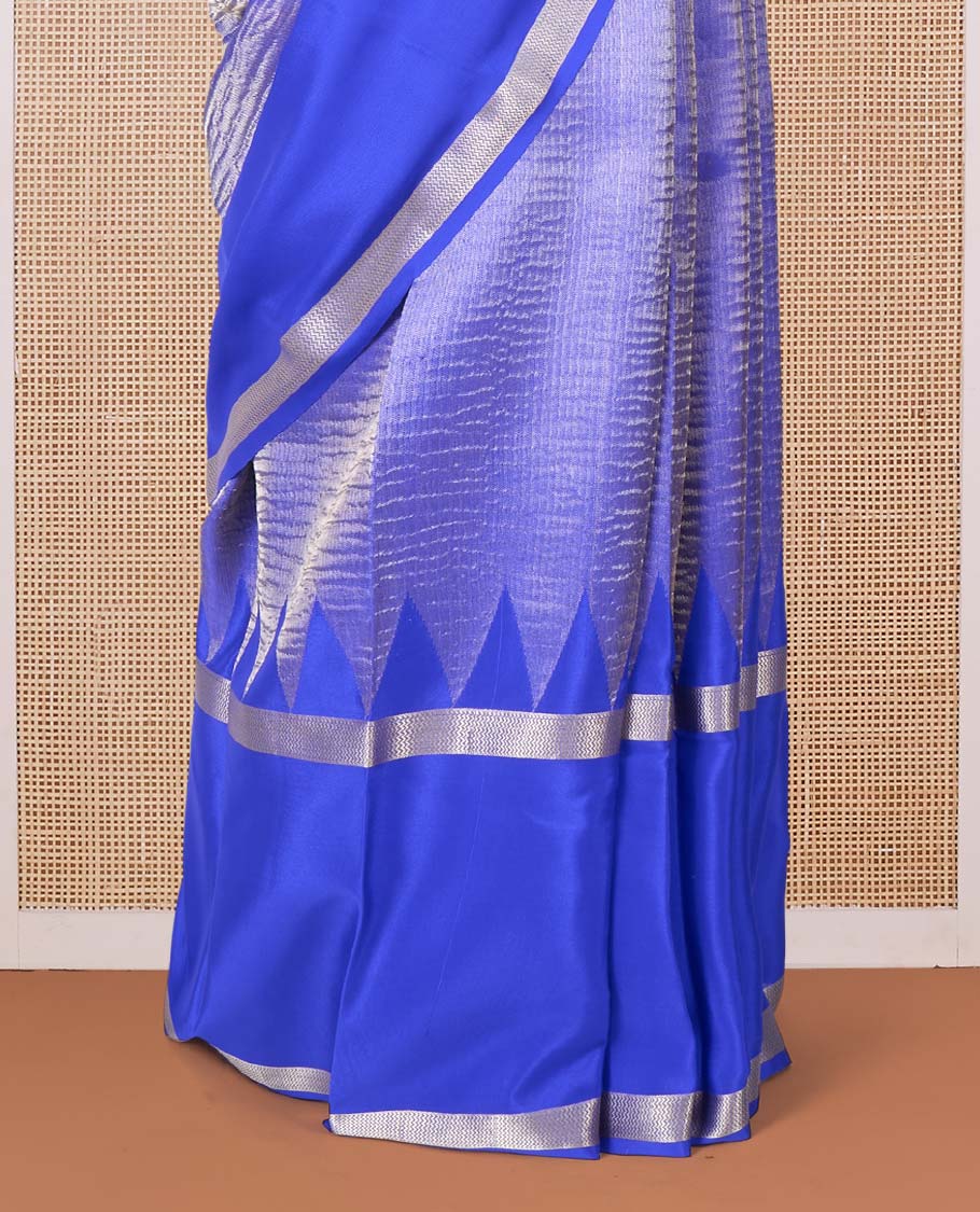 Blue shimmer Mysore silk saree, contrast rettai pettu traditional designs, and pallu of Pichwai cow motifs