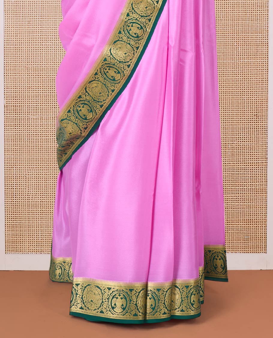 Pink plain Mysore silk saree, contrast border of two-headed eagle, and yaali designs, and zari striped pallu