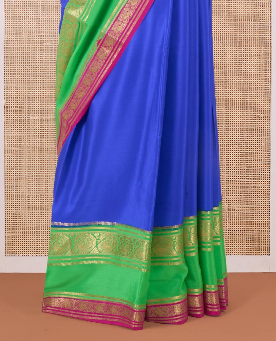Blue plain Mysore silk saree, contrast traditional zari rettai pettu border, and zari striped pallu