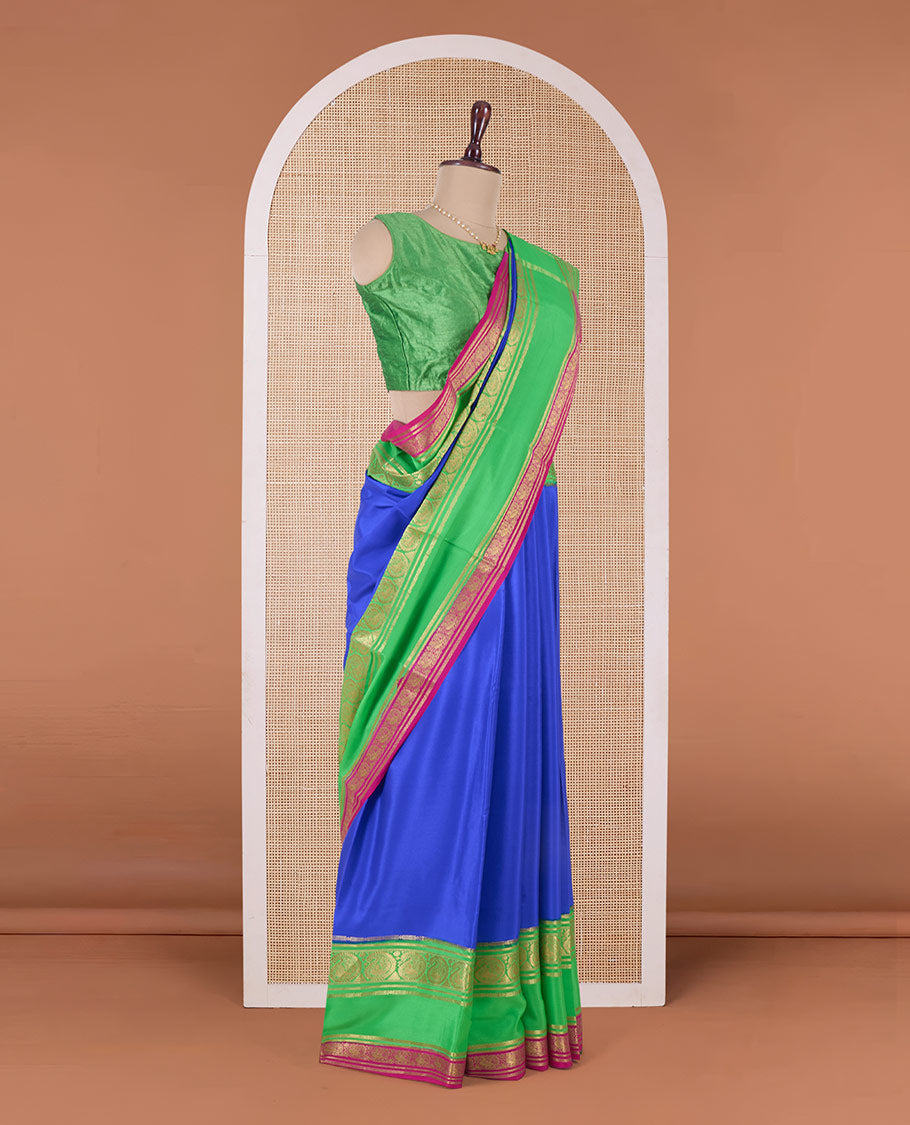 Blue plain Mysore silk saree, contrast traditional zari rettai pettu border, and zari striped pallu