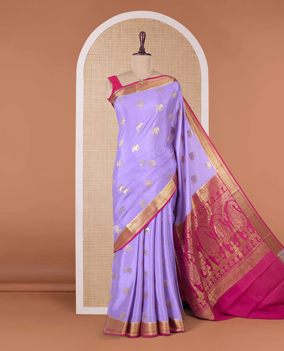 Lavender elephant motifs woven Mysore silk saree, contrast traditional zari border, and pallu of big paisley designs