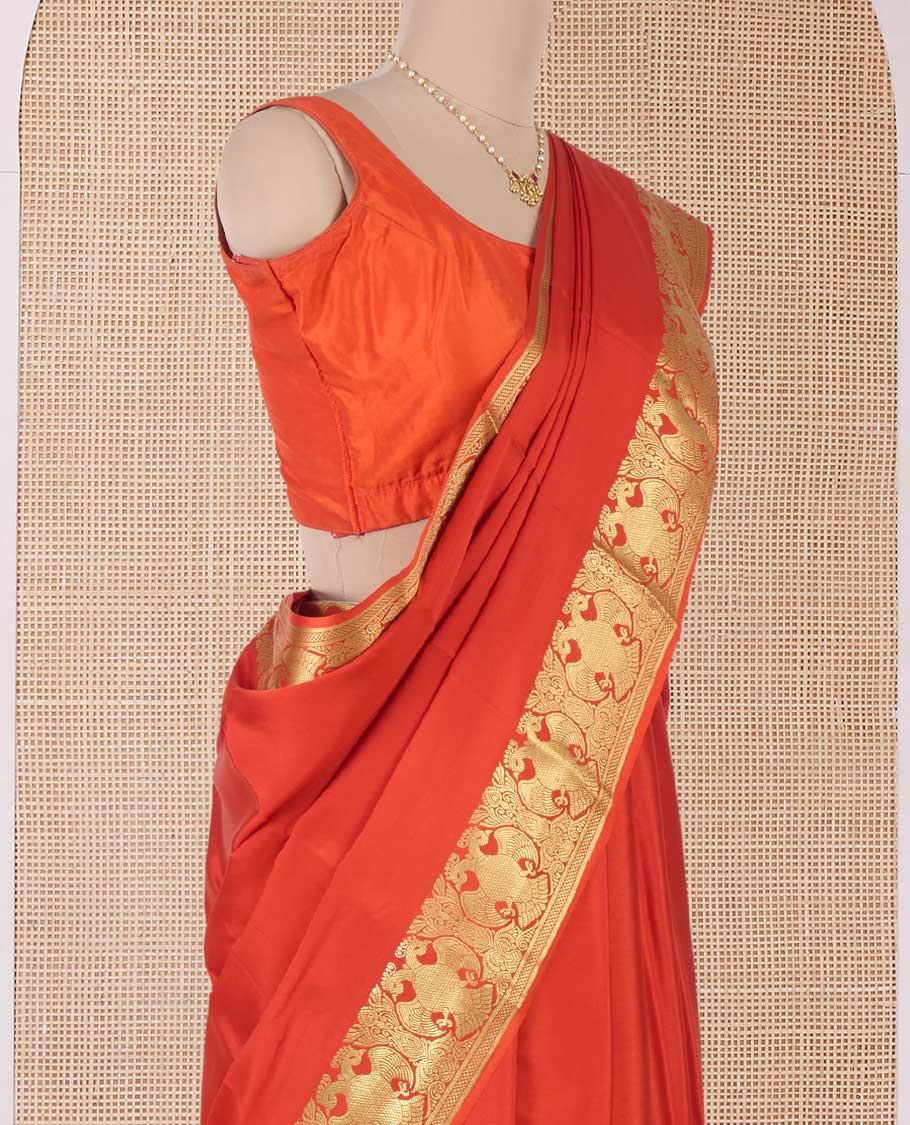 Orange plain Mysore silk saree, two-headed eagle motifs zari border, and pallu