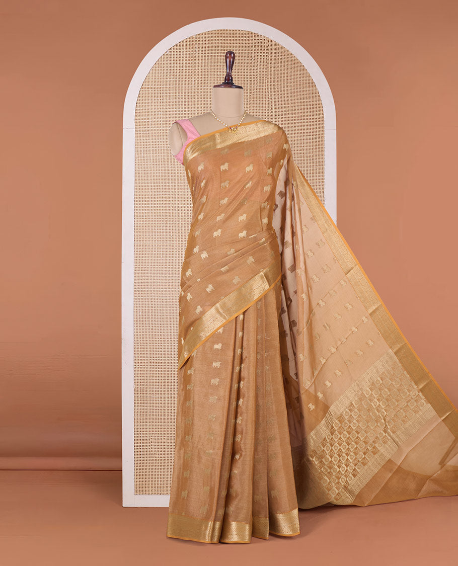 Light orange Pichwai cow motifs Mysore silk saree, traditional zari border, and intricately woven pallu