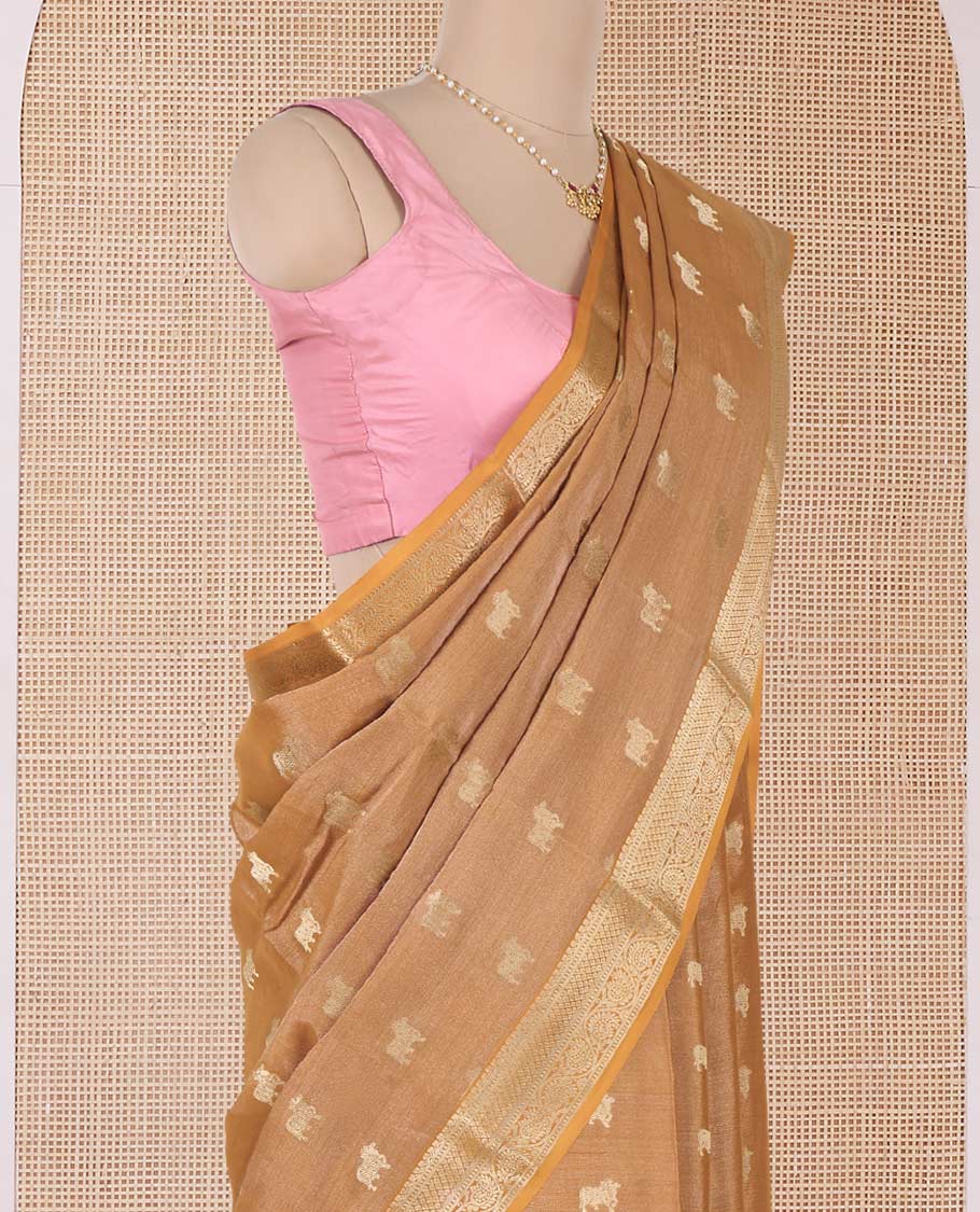 Light orange Pichwai cow motifs Mysore silk saree, traditional zari border, and intricately woven pallu