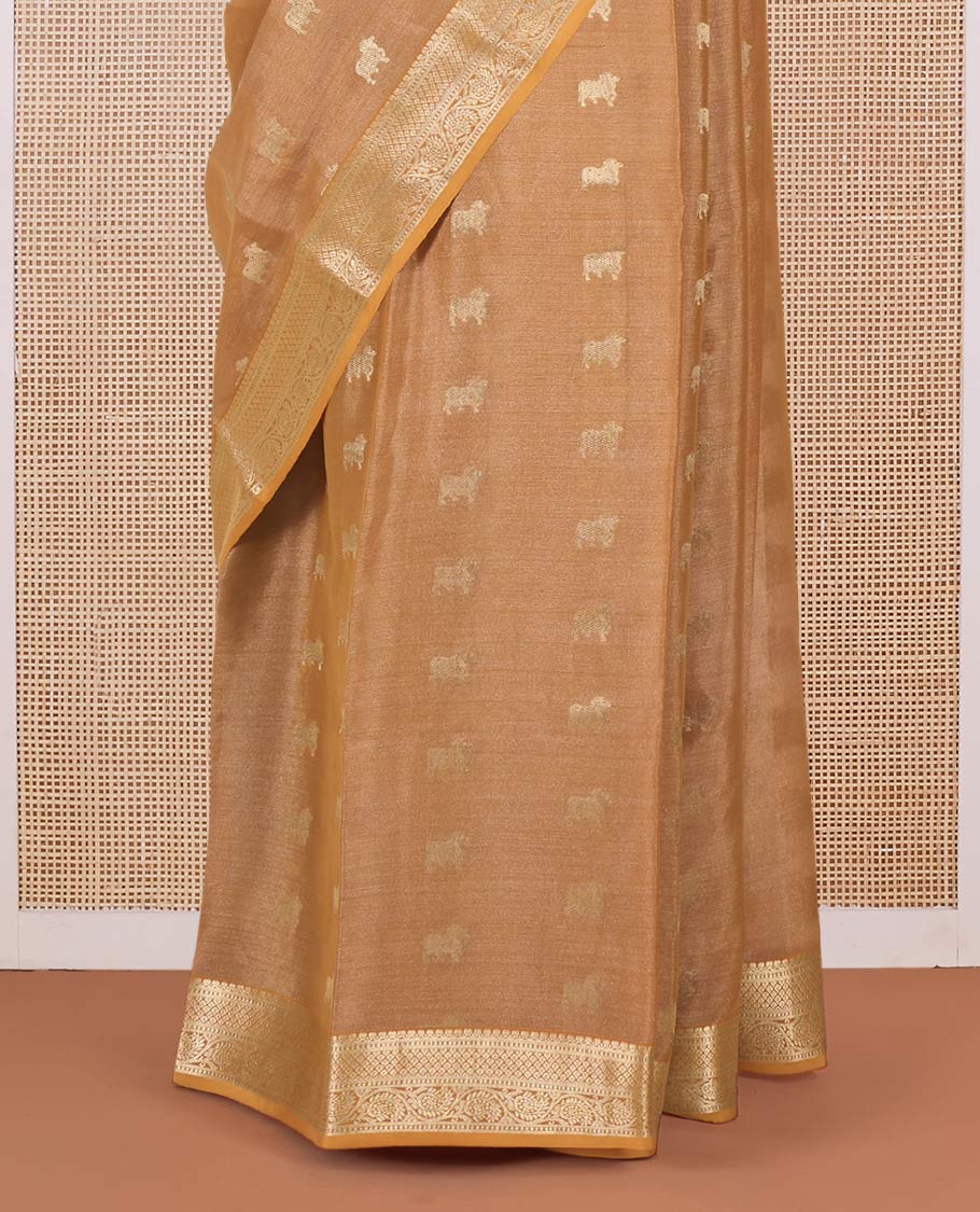 Light orange Pichwai cow motifs Mysore silk saree, traditional zari border, and intricately woven pallu