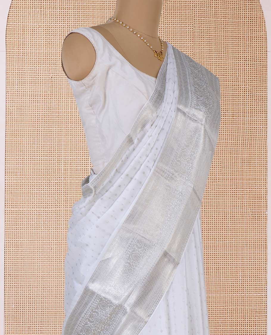 White zari buttas Mysore silk saree, traditional zari border, and intricate pallu
