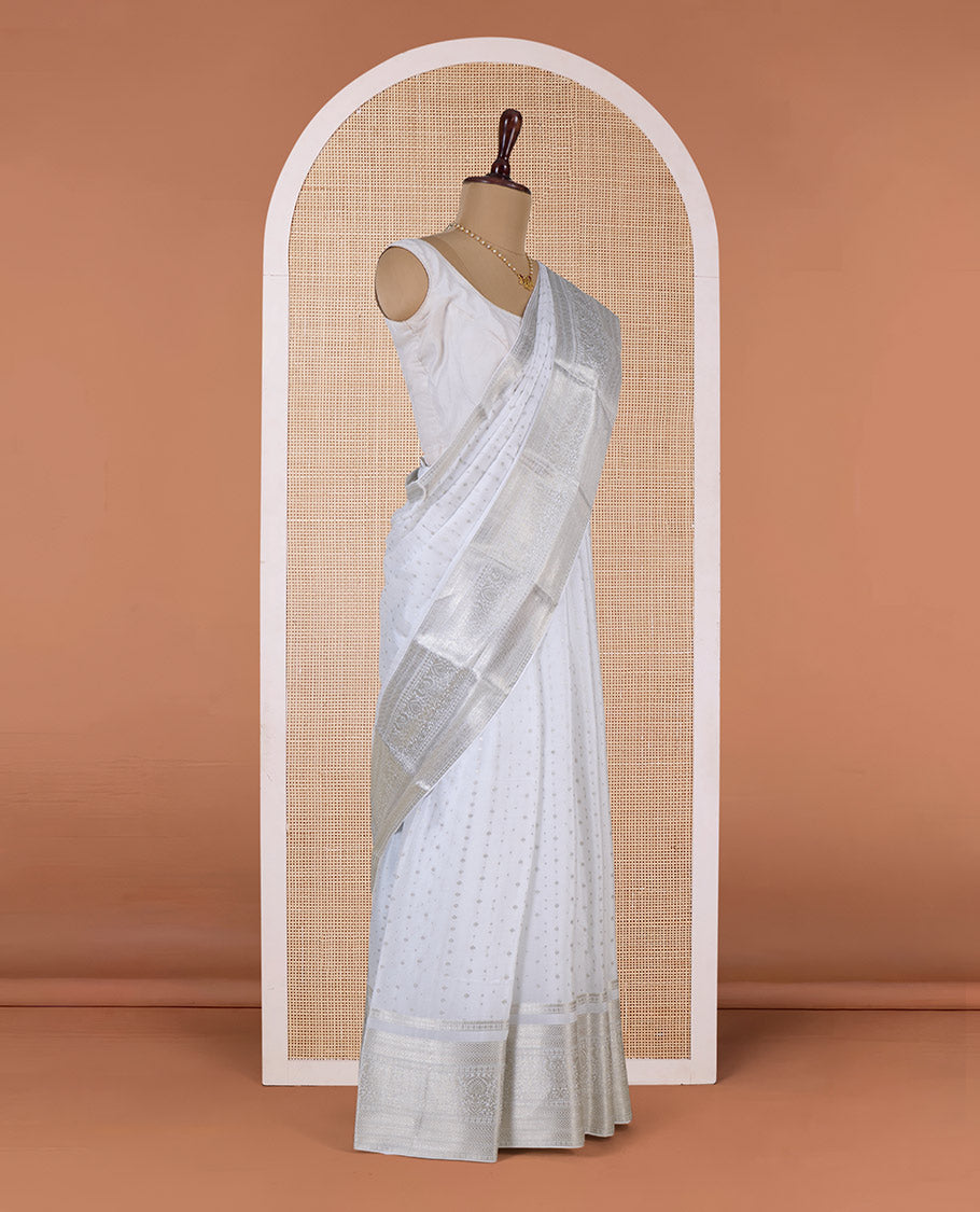 White zari buttas Mysore silk saree, traditional zari border, and intricate pallu
