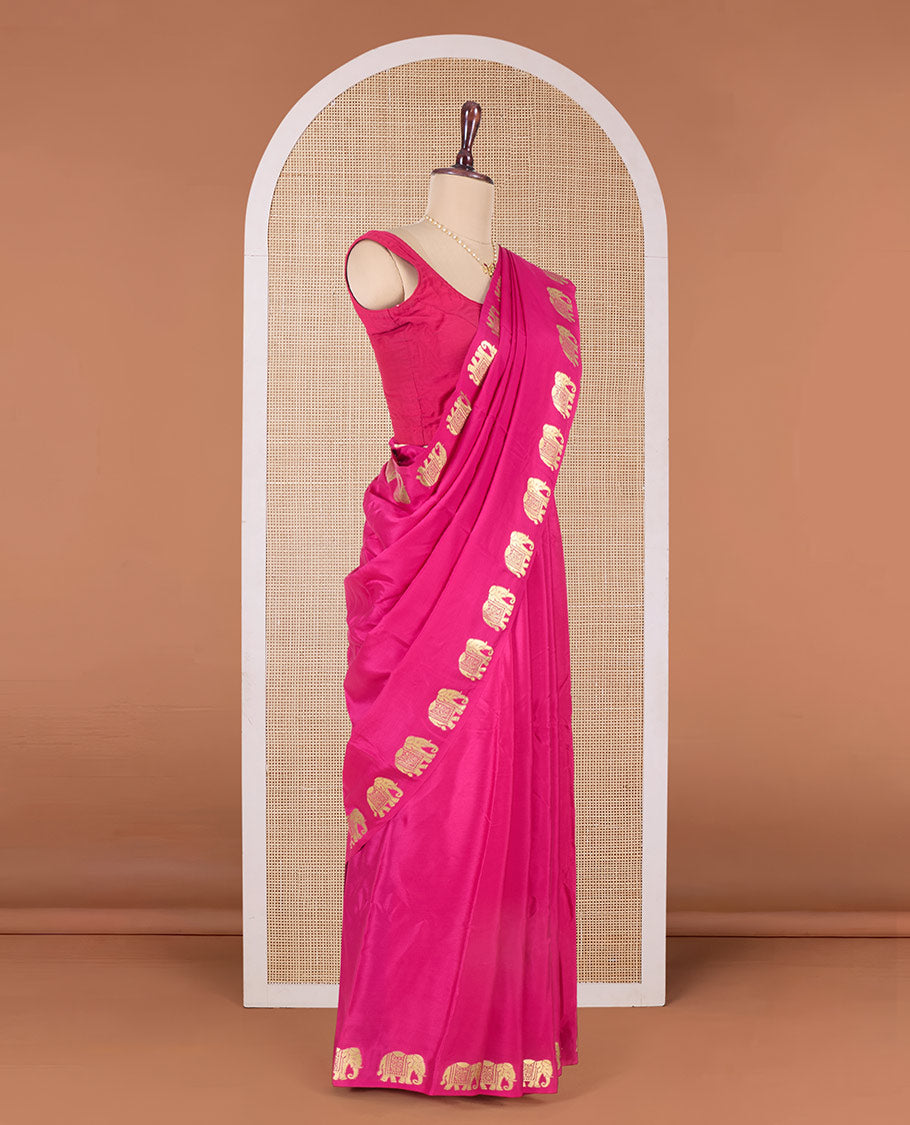 Pink plain Mysore silk saree with elephant motifs zari border, and pallu of miniatures of elephant motifs