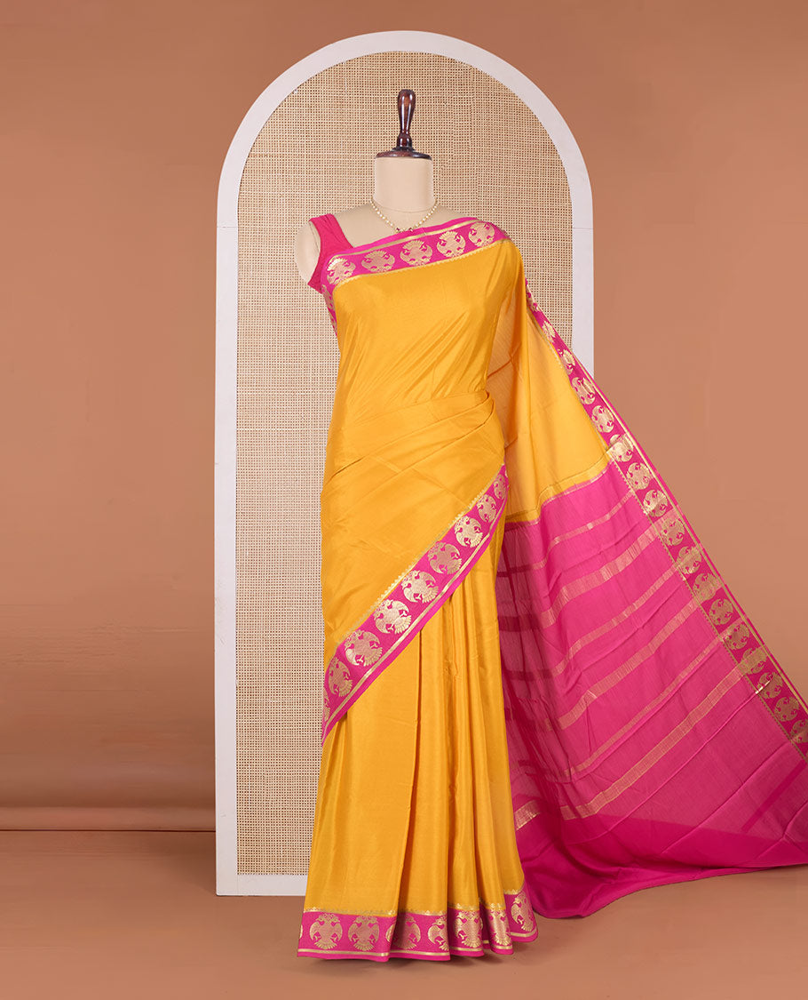 Yellow plain Mysore silk saree, contrast two-headed eagle zari border, and pallu of stripes