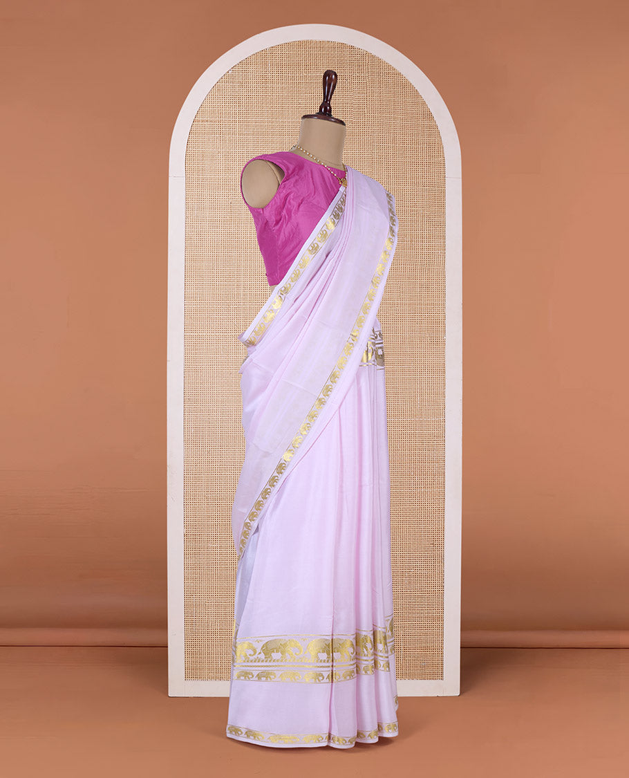 Baby pink plain Mysore silk saree, rettai pettu border of elephant motifs, and pallu of stripes in zari