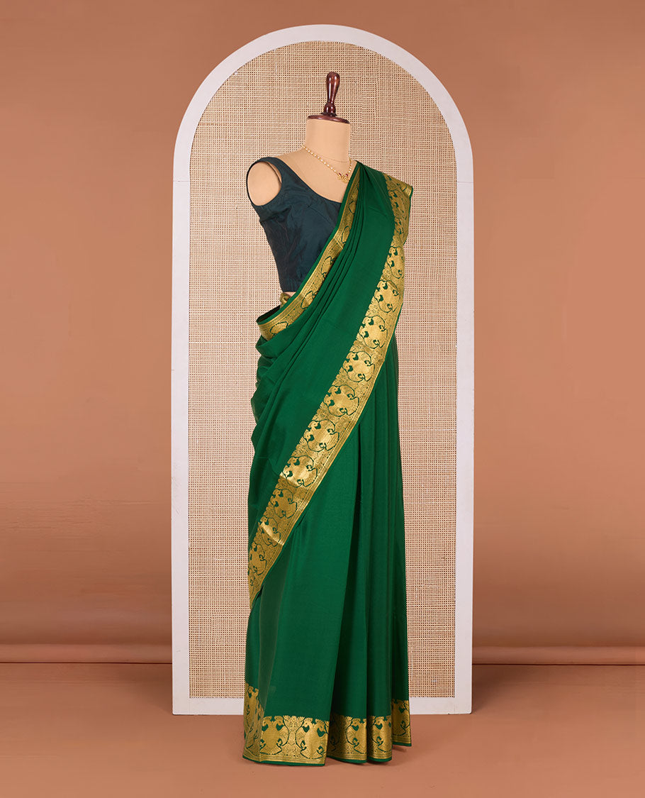 Green plain Mysore silk saree, two-headed eagle motifs zari woven border, and pallu steeped with two-headed eagle motifs